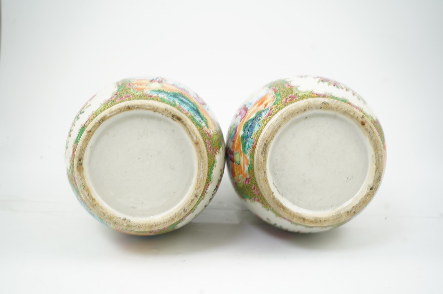 A pair of Chinese famille rose baluster vases, 19th century